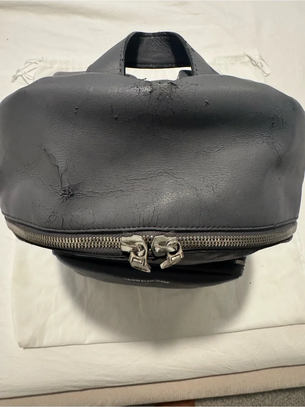 Calvin Klein Jeans Black Leather-Look Backpack with Front Pocket